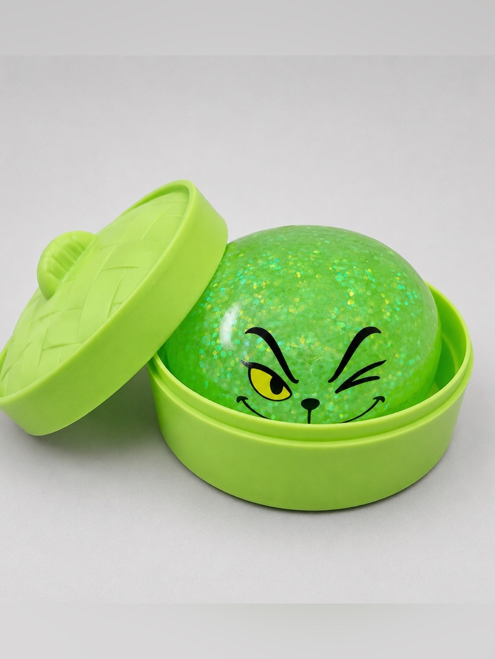 The Grinch Green Glitter Squishy Dumpling Winking Face with Storage Case